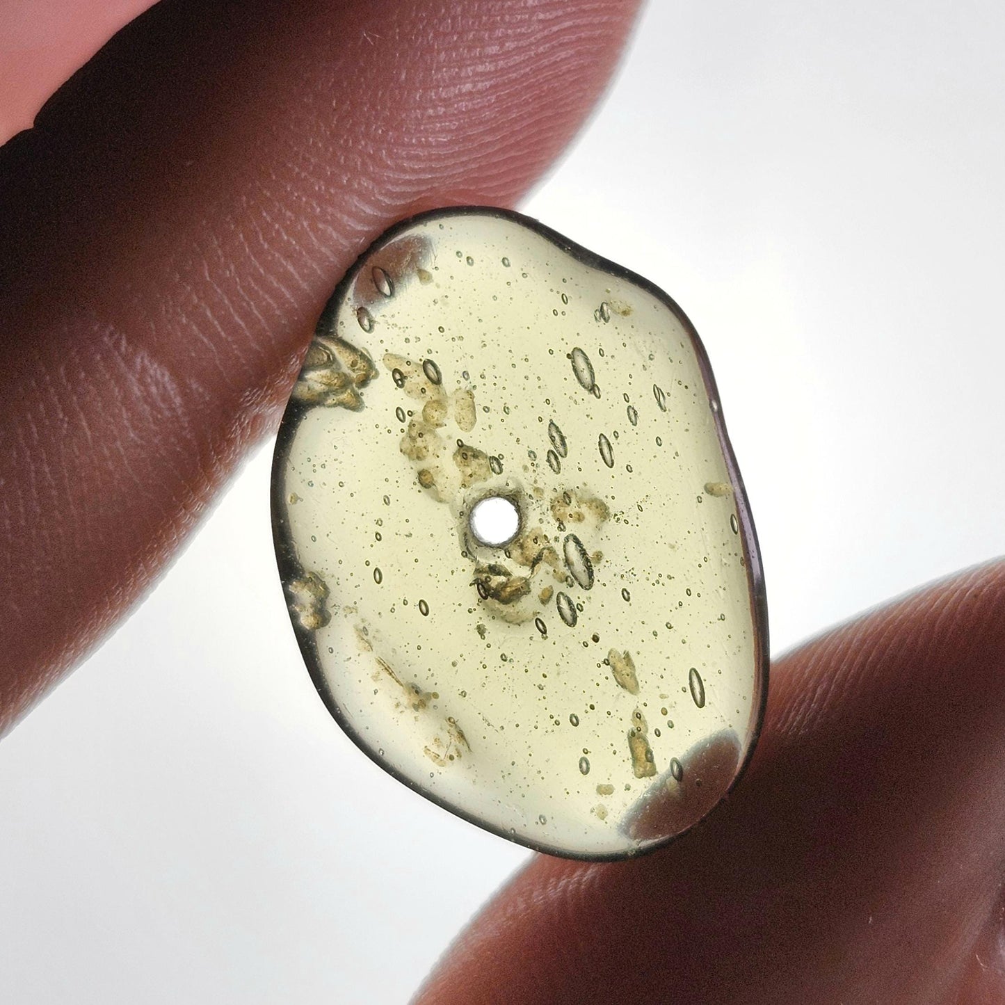 Polished Moldavite Bead: Authentic Czech Tektite Crystal (1.4g, 20mm x 14mm x 2mm)