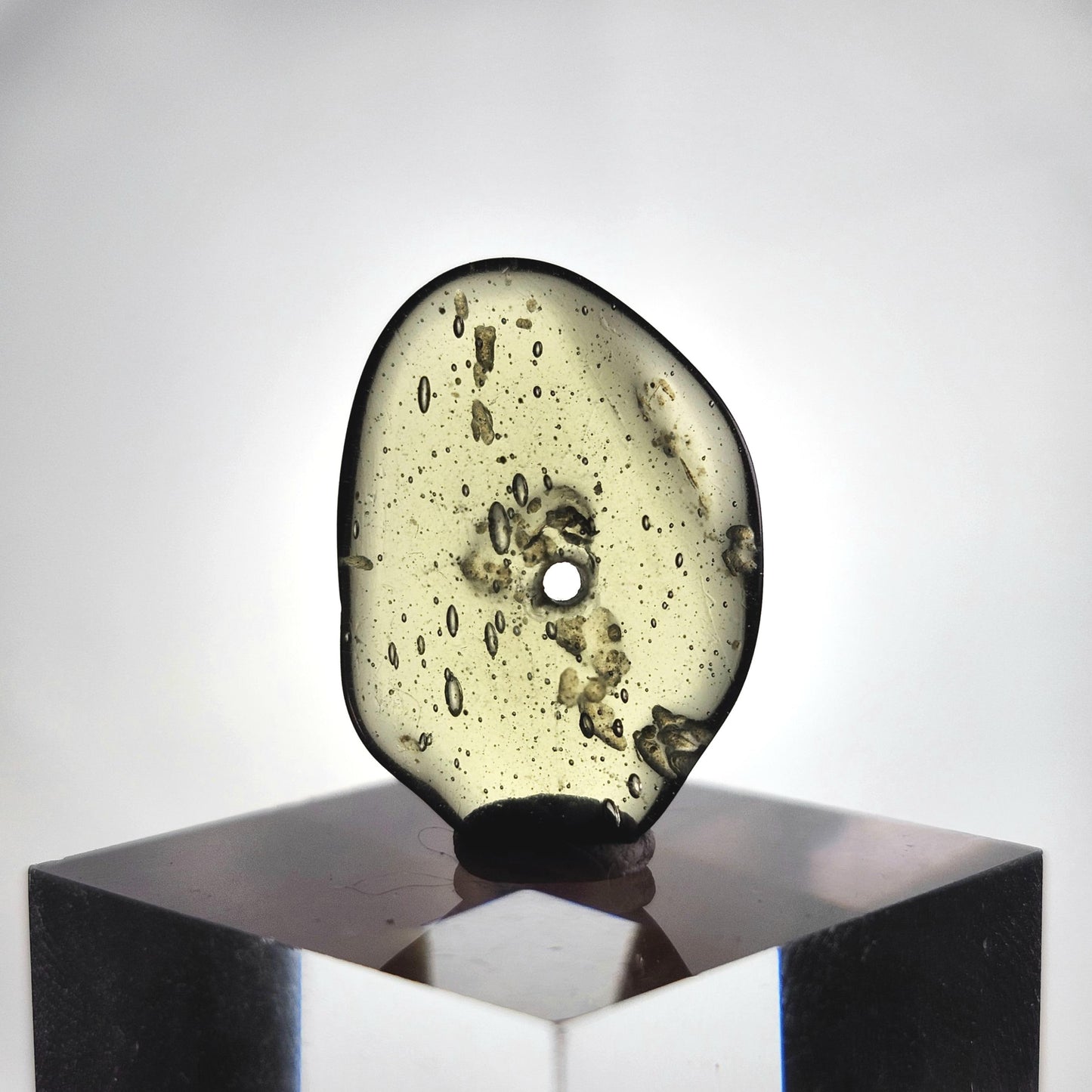 Polished Moldavite Bead: Authentic Czech Tektite Crystal (1.4g, 20mm x 14mm x 2mm)