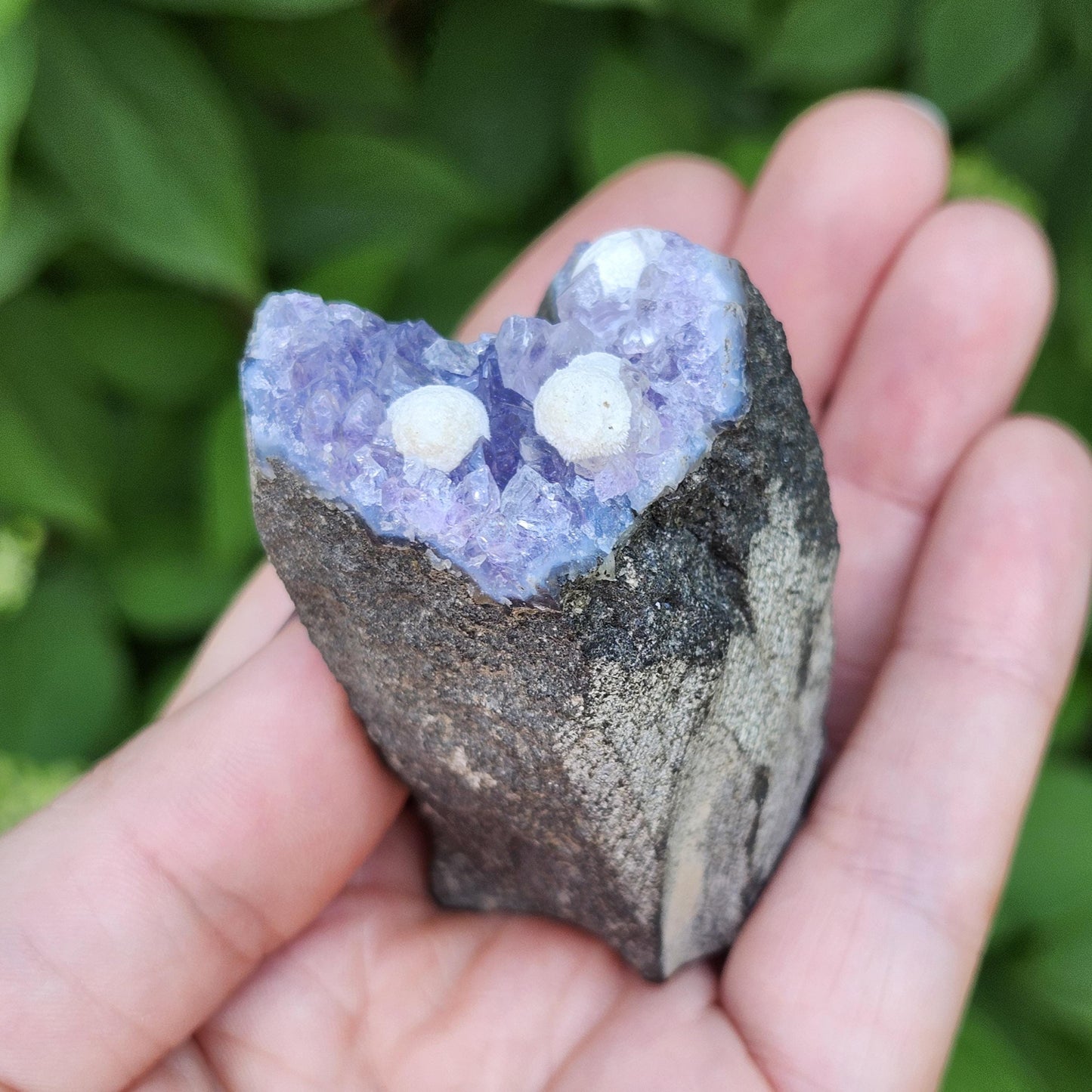 Mordenite Spheres on Amethyst