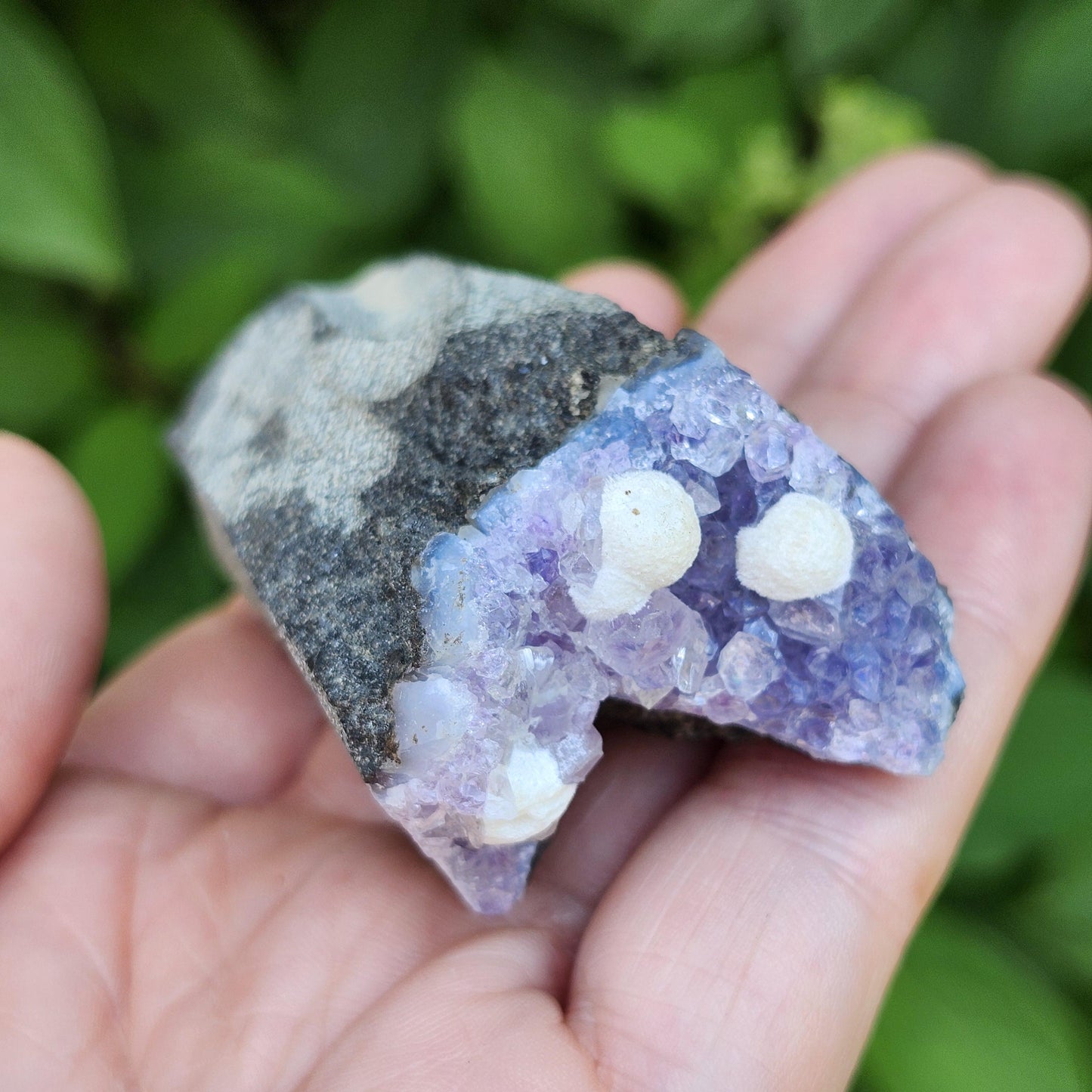 Mordenite Spheres on Amethyst