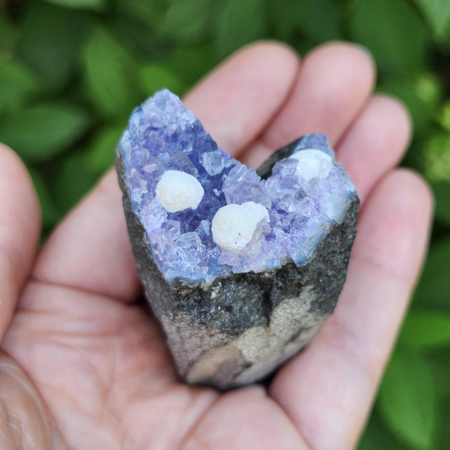 Mordenite Spheres on Amethyst