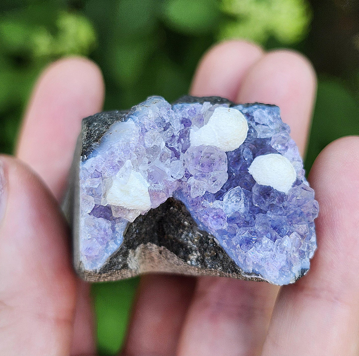 Mordenite Spheres on Amethyst