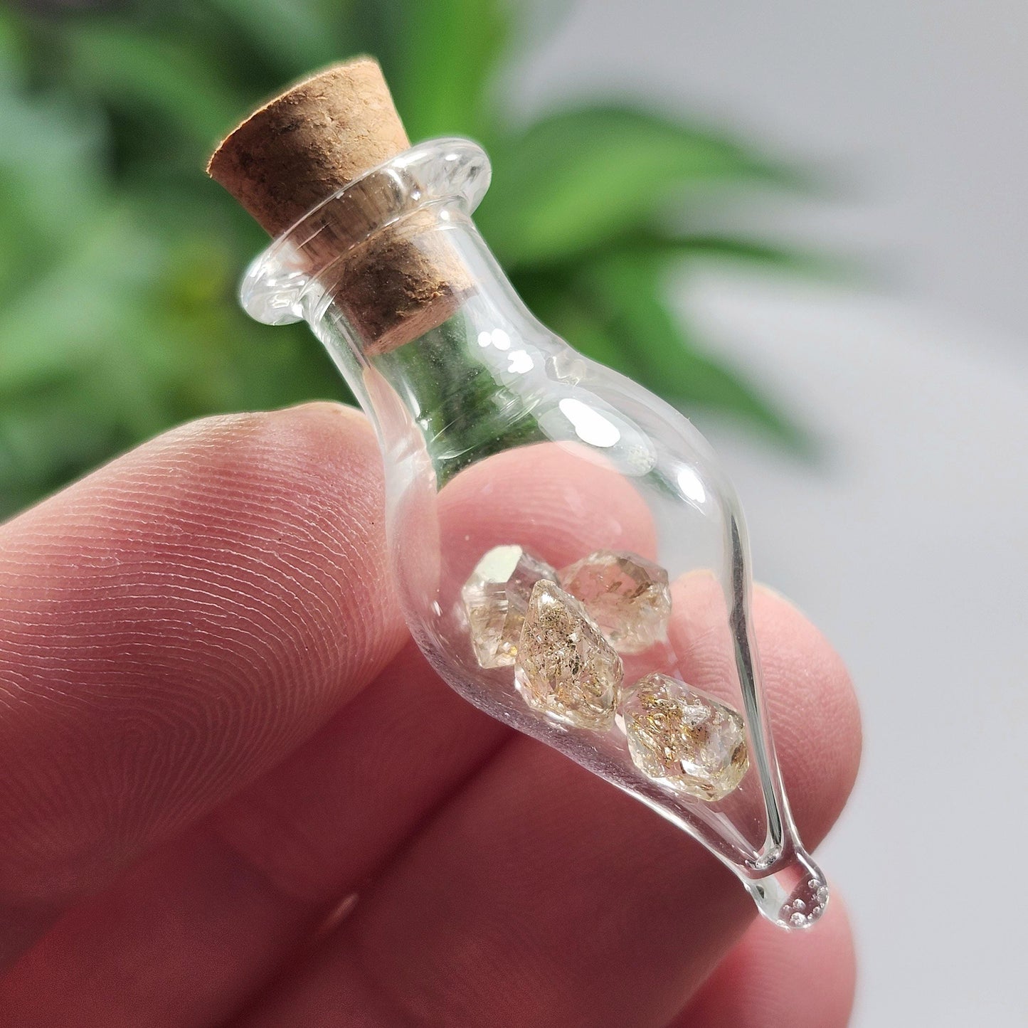 Enhydro Petroleum Quartz in Glass Jar: UV Reactive Petroleum Enhydro Diamond Quartz Crystals