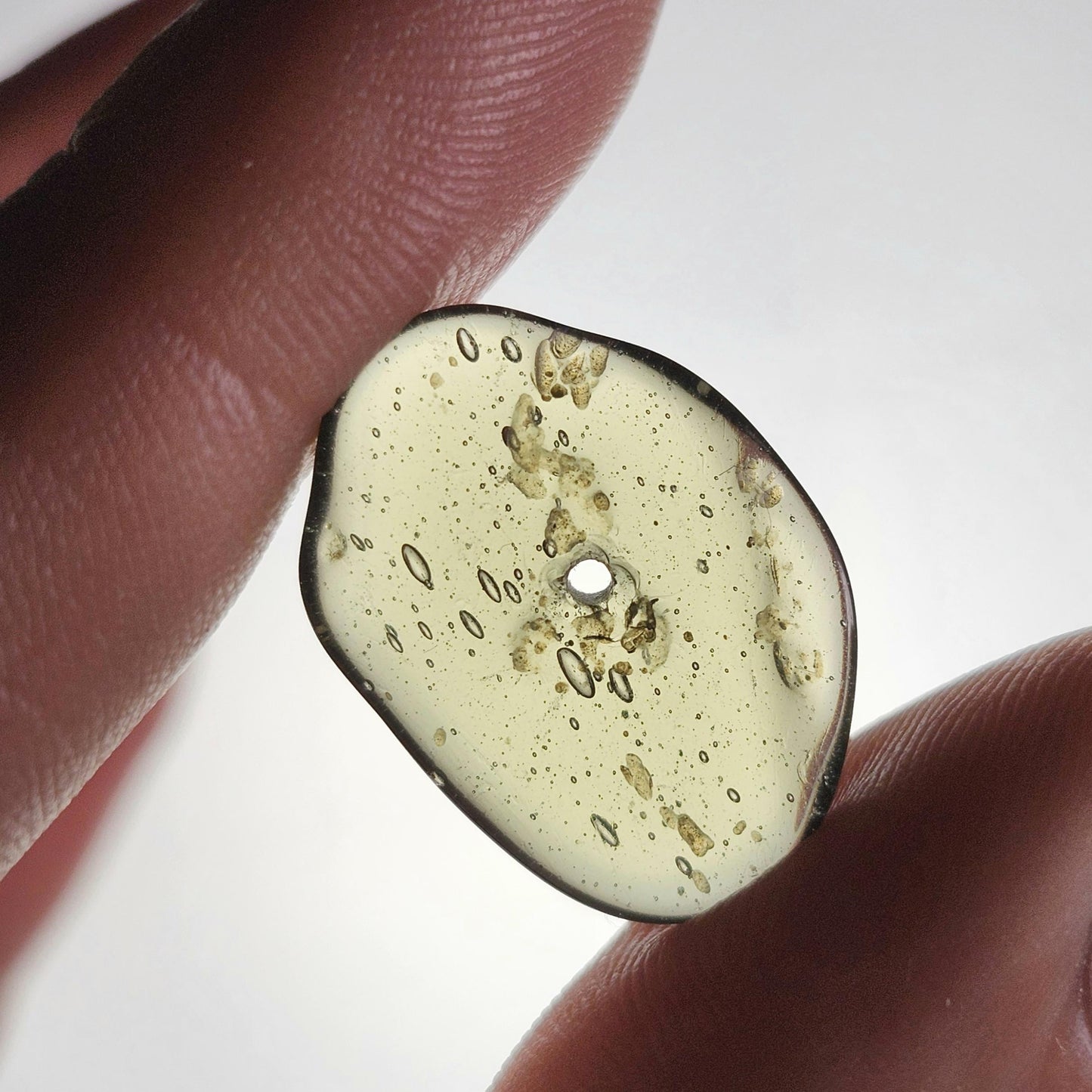 Polished Moldavite Bead: Authentic Czech Tektite Crystal (1.4g, 20mm x 14mm x 2mm)
