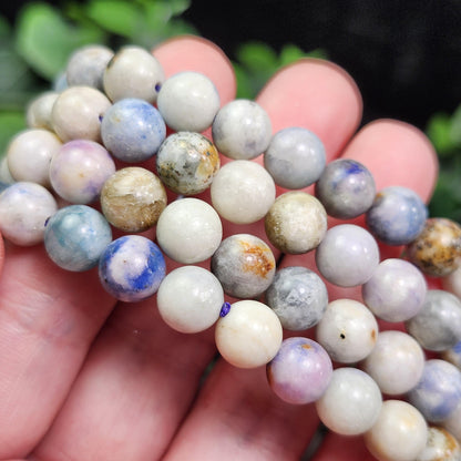 Hackmanite Crystal Bracelet: UV Reactive Polished Hackmanite Beads