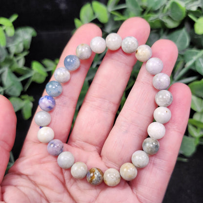 Hackmanite Crystal Bracelet: UV Reactive Polished Hackmanite Beads