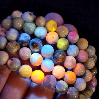 Hackmanite Crystal Bracelet: UV Reactive Polished Hackmanite Beads