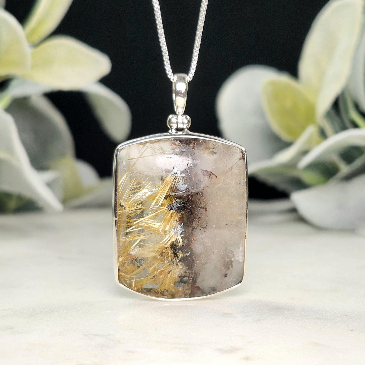 Rutilated Hematite Star in Quartz Pendant