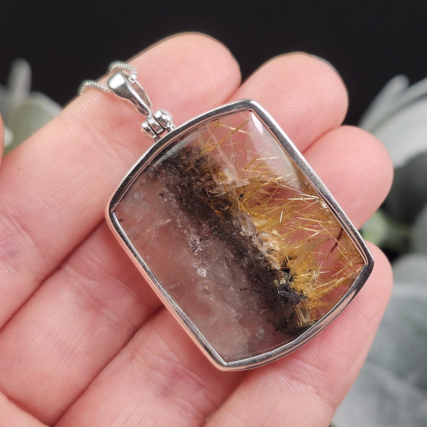 Rutilated Hematite Star in Quartz Pendant