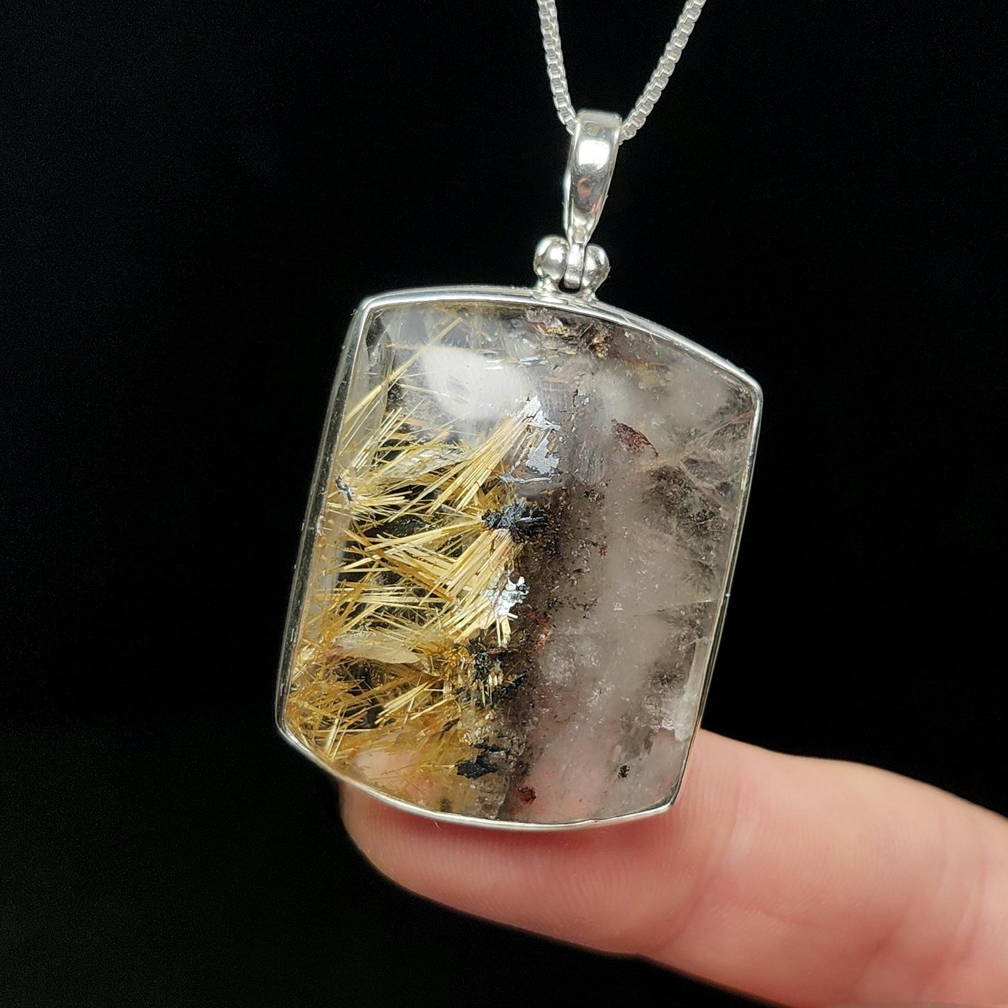 Rutilated Hematite Star in Quartz Pendant