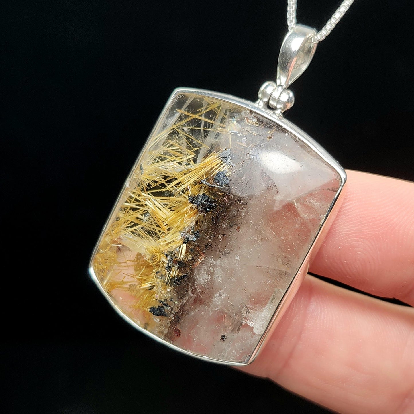 Rutilated Hematite Star in Quartz Pendant