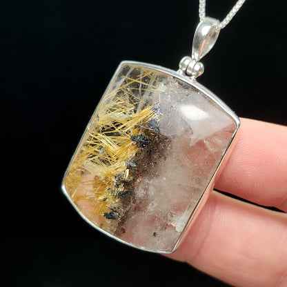 Rutilated Hematite Star in Quartz Pendant