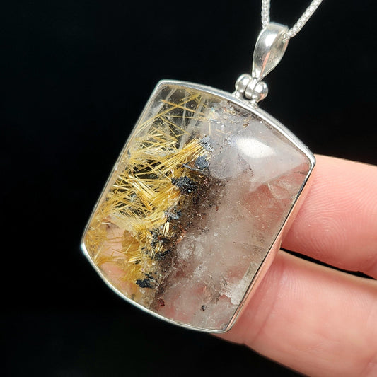 Rutilated Hematite Star in Quartz Pendant