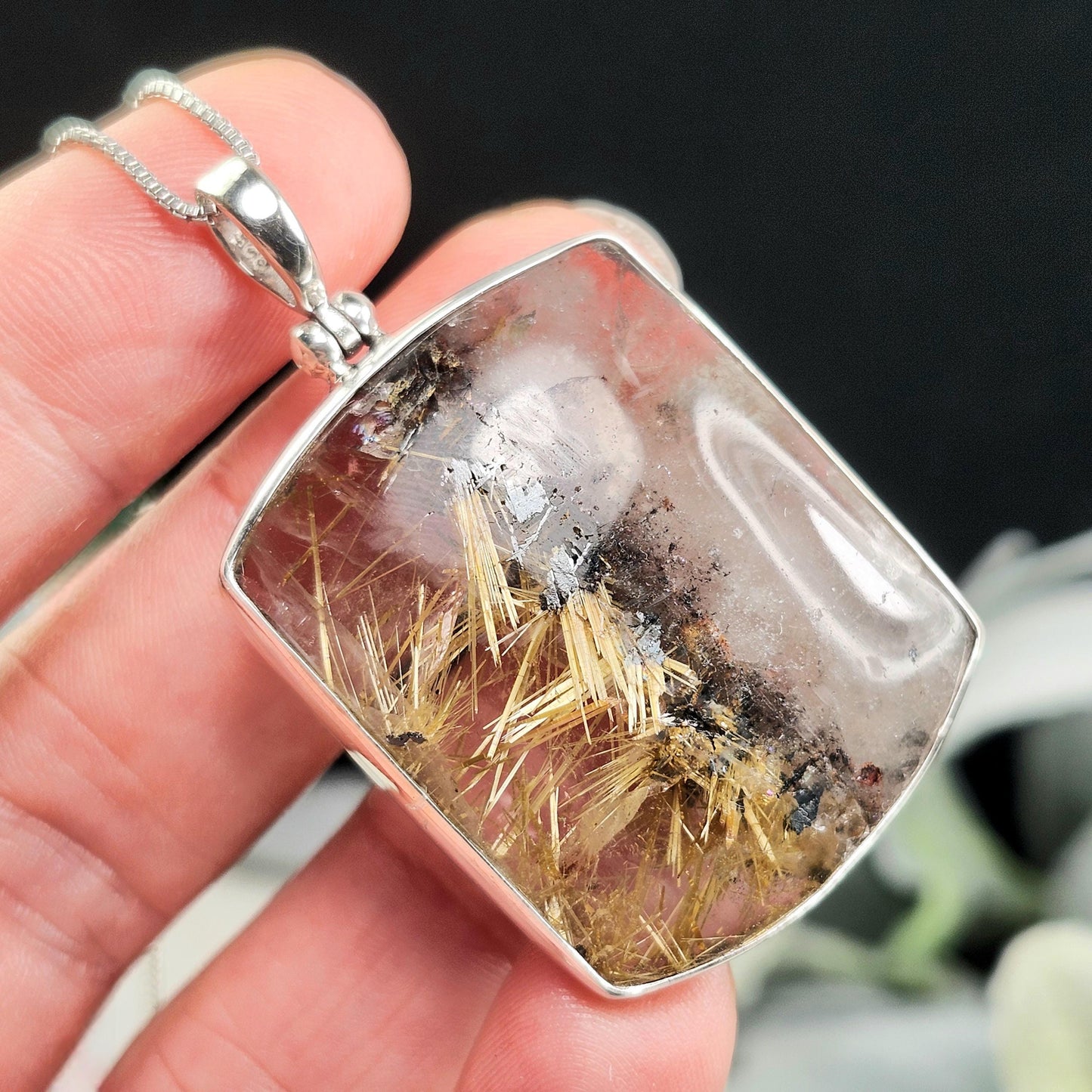 Rutilated Hematite Star in Quartz Pendant