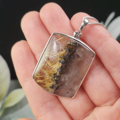 Rutilated Hematite Star in Quartz Pendant