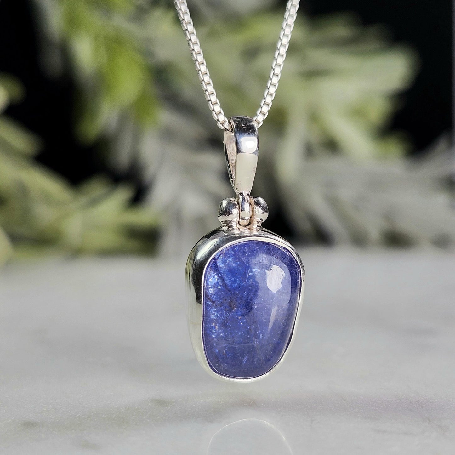 Polished Blue Tanzanite Pendant, Sterling Silver