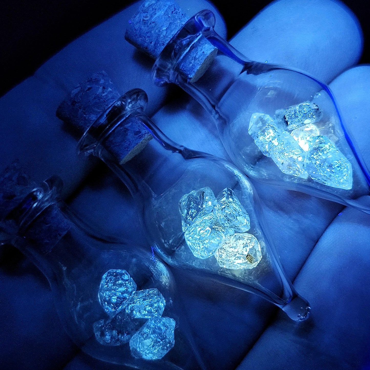 Enhydro Petroleum Quartz in Glass Jar: UV Reactive Petroleum Enhydro Diamond Quartz Crystals