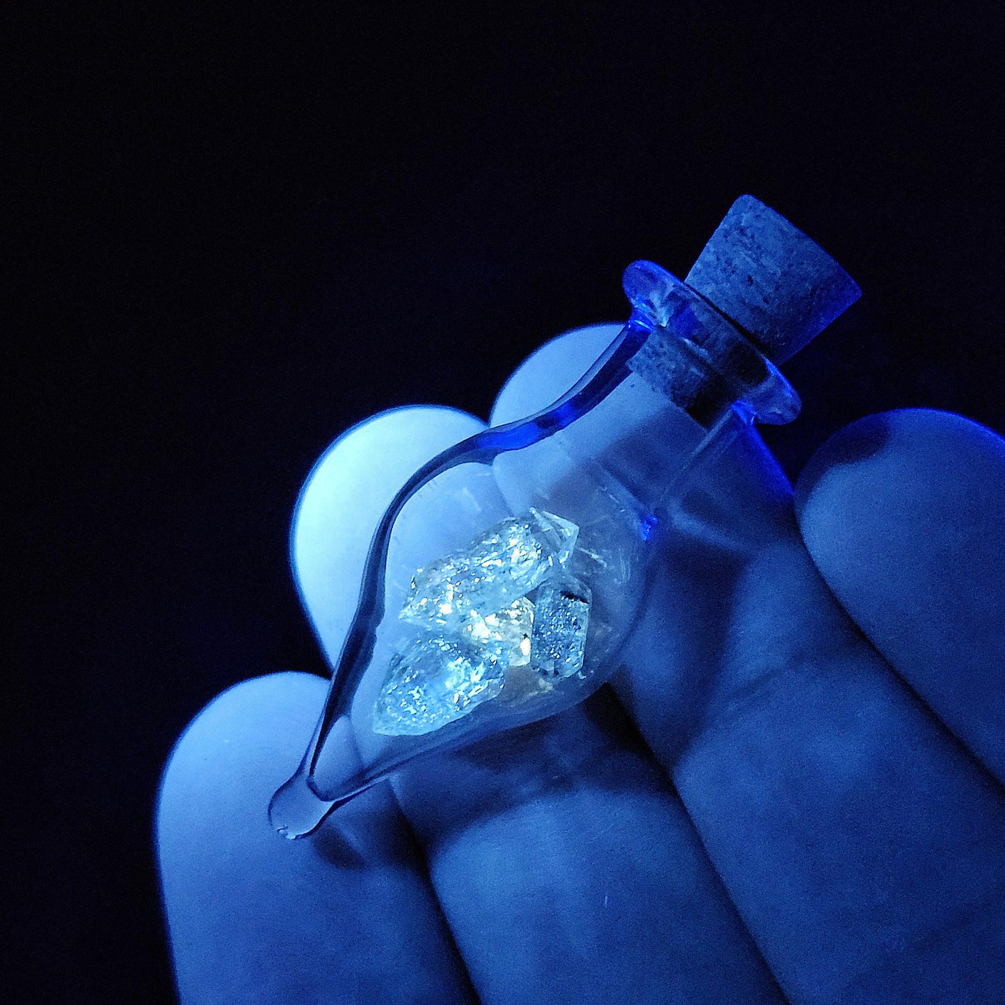 Enhydro Petroleum Quartz in Glass Jar: UV Reactive Petroleum Enhydro Diamond Quartz Crystals