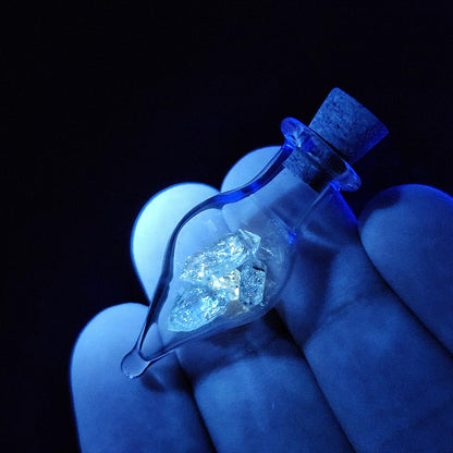 Enhydro Petroleum Quartz in Glass Jar: UV Reactive Petroleum Enhydro Diamond Quartz Crystals