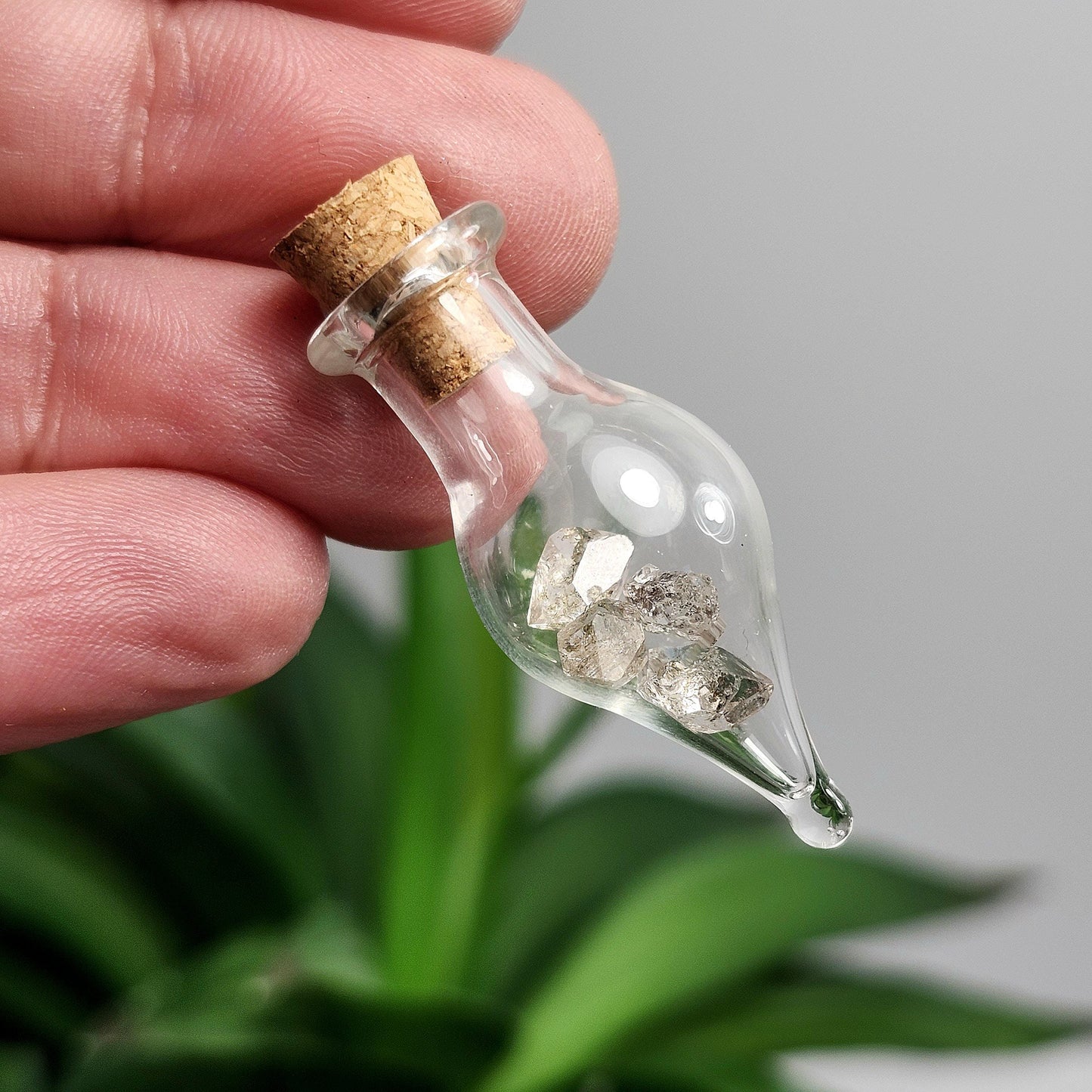 Enhydro Petroleum Quartz in Glass Jar: UV Reactive Petroleum Enhydro Diamond Quartz Crystals