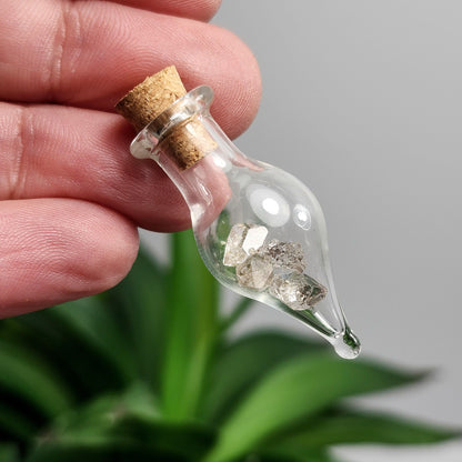 Enhydro Petroleum Quartz in Glass Jar: UV Reactive Petroleum Enhydro Diamond Quartz Crystals