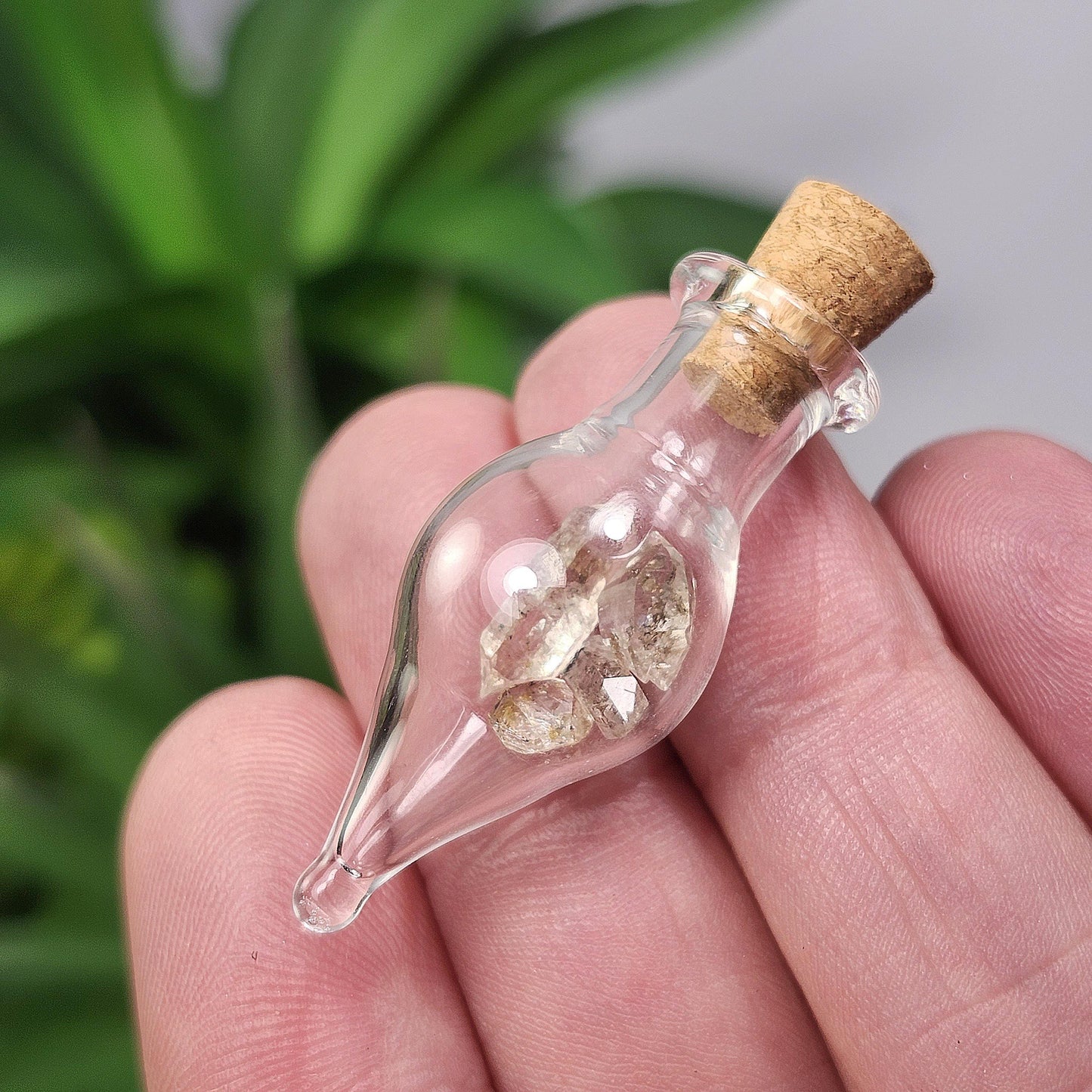 Enhydro Petroleum Quartz in Glass Jar: UV Reactive Petroleum Enhydro Diamond Quartz Crystals
