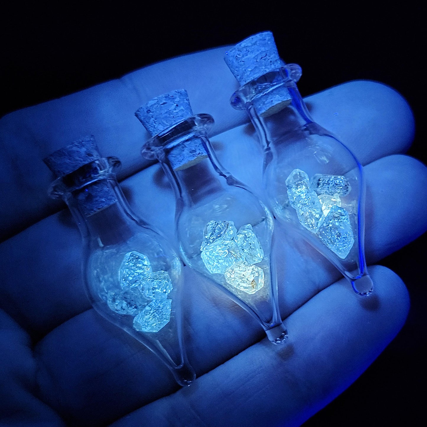 Enhydro Petroleum Quartz in Glass Jar: UV Reactive Petroleum Enhydro Diamond Quartz Crystals