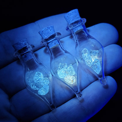 Enhydro Petroleum Quartz in Glass Jar: UV Reactive Petroleum Enhydro Diamond Quartz Crystals