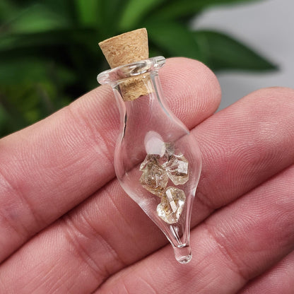 Enhydro Petroleum Quartz in Glass Jar: UV Reactive Petroleum Enhydro Diamond Quartz Crystals